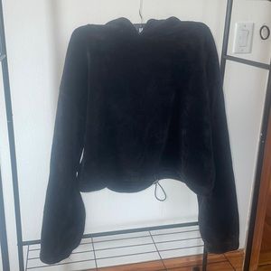 thick soft fuzzy hoodie can be cropped with the draw string